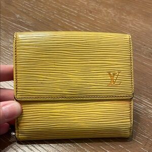 Used Louis Vuitton Epi yellow/purple double snap compact wallet
